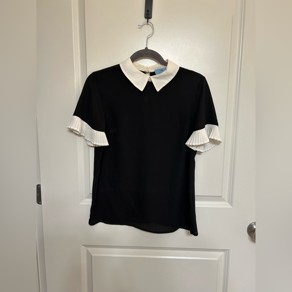 CeCe Two-Tone Black and Cream Top